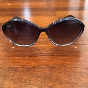 Sunglasses by “Ray•Ban”